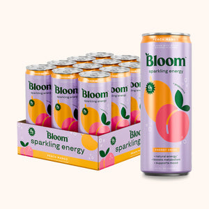 Pack of Bloom sparkling energy peach mango cans on a white background